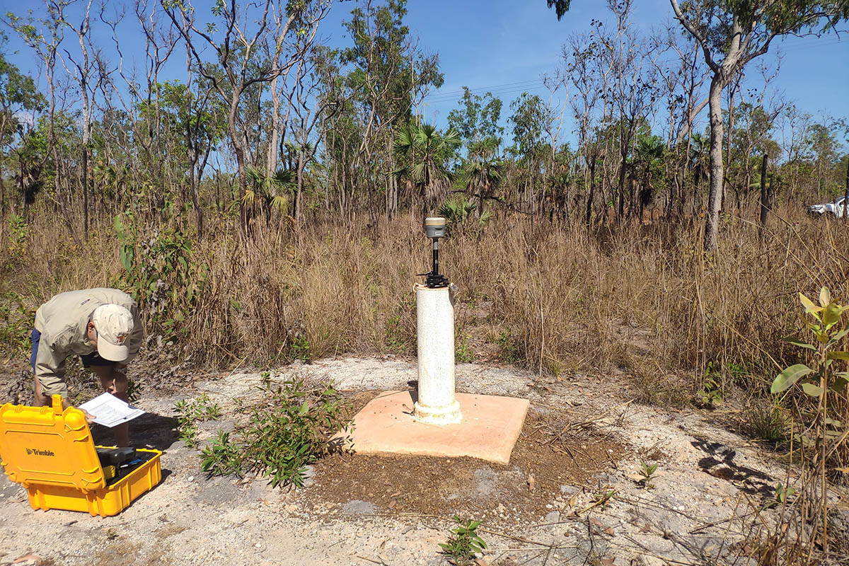 Collecting groundwater data in the Darwin Rural area, in this case specifically surveying the location and elevation of the groundwater bore.